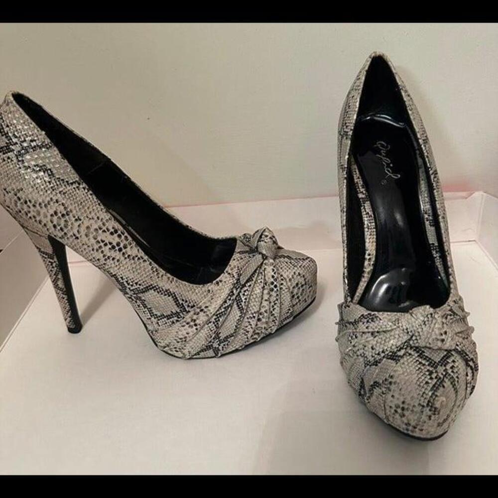 Wildly Chic Snakeskin Stilettos - Elevate Your Style Game